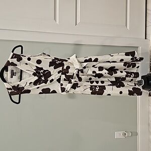 Sleeveless pleat floral flare dress